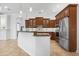 Kitchen area featuring granite countertops, stainless steel appliances, and plenty of cabinet space at 984 Chickadee Dr, Venice, FL 34285