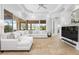 Cozy living room featuring modern ceiling detail and a view into the screened lanai at 984 Chickadee Dr, Venice, FL 34285