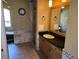 Bathroom featuring a vanity, shower, and soaking tub at 9127 Woodridge Run Dr, Tampa, FL 33647