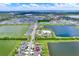 Aerial view of neighborhood featuring a community pool at 1015 7Th Nw Ave, Ruskin, FL 33570