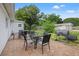 An outdoor patio featuring a brick surface, seating and a grill for entertaining at 1035 58Th N Ave, St Petersburg, FL 33703