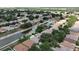 A panoramic view shows a residential area with homes situated along winding canals, perfect for a waterfront lifestyle at 10449 Hunters Haven Blvd, Riverview, FL 33578