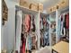 Spacious walk-in closet with ample shelving, built-in organization, and plentiful hanging storage at 10449 Hunters Haven Blvd, Riverview, FL 33578