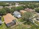 Spacious fenced backyard in a vibrant community setting with mature trees and landscaping at 11121 Running Pine Dr, Riverview, FL 33569