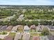 Aerial shot of backyard pool, showcasing serene suburban living with lush greenery at 11121 Running Pine Dr, Riverview, FL 33569
