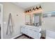 Bright bathroom features a double vanity, modern fixtures, and stylish design at 11121 Running Pine Dr, Riverview, FL 33569