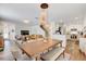 Open-concept living space featuring a dining area, living room, and kitchen at 11121 Running Pine Dr, Riverview, FL 33569