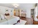 Airy main bedroom with hardwood floors, ensuite bathroom and ample space at 11121 Running Pine Dr, Riverview, FL 33569