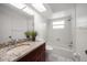 Bathroom featuring granite countertop vanity, toilet, and bathtub at 1142 Lancer Ln, Tarpon Springs, FL 34689