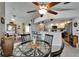 Bright kitchen features stainless steel appliances and an open floor plan with a dining area at 1201 Peridot Ln, Sun City Center, FL 33573
