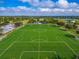 Aerial view of well-maintained soccer fields with white line markings and lush green turf at 12202 Fairlawn Dr, Riverview, FL 33579