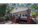 Inviting home with a cozy covered porch and traditional design elements at 1221 E Osborne Ave, Tampa, FL 33603