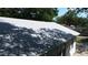 Aerial close up of the roof and exterior at 1221 E Osborne Ave, Tampa, FL 33603