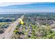 Aerial view shows the location and the surrounding neighborhood at 1249 Abbey Crescent Ln, Clearwater, FL 33759