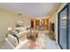 Bright living room featuring a dining area and a sliding glass door at 1249 Abbey Crescent Ln, Clearwater, FL 33759