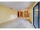 Bright living room with a dining area and a sliding glass door at 1249 Abbey Crescent Ln, Clearwater, FL 33759