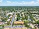 Charming community with a sparkling pool nestled in a lush, green landscape at 12760 Indian Rocks Rd # 410, Largo, FL 33774