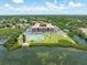 Stunning waterfront building featuring a tennis court, shuffleboard, and serene water views at 12760 Indian Rocks Rd # 410, Largo, FL 33774