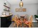 A cozy dining area with a glass table, stylish chairs, and modern decor to complement the condo's inviting atmosphere at 12760 Indian Rocks Rd # 410, Largo, FL 33774