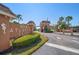 Entrance to New Atlantis Club featuring well-maintained landscaping, clear signage, and architectural detail at 12760 Indian Rocks Rd # 410, Largo, FL 33774