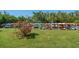 Outdoor storage for kayaks and canoes on a grassy area, perfect for water enthusiasts at 12760 Indian Rocks Rd # 410, Largo, FL 33774