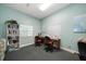 This office features a desk, bookshelves, and natural light, creating a comfortable workspace at 12760 Indian Rocks Rd # 410, Largo, FL 33774
