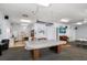 Large recreational room featuring a billiard table, piano and other amenities, offering a variety of leisure options at 12760 Indian Rocks Rd # 410, Largo, FL 33774