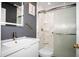 Updated bathroom boasts modern fixtures, vanity, a stylish shower, and a sleek, inviting atmosphere at 1603 Fluorshire Dr, Brandon, FL 33511