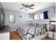 Relaxing primary bedroom suite features a ceiling fan and large bed for comfortable living at 1603 Fluorshire Dr, Brandon, FL 33511
