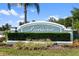Welcoming Providence Townhomes sign with lush landscaping and a clear blue sky at 1603 Fluorshire Dr, Brandon, FL 33511