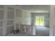 Under construction interior showing framed walls, and roughed in plumbing in a home under construction at 17099 Carleen Ave, Port Charlotte, FL 33948