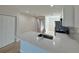Bright kitchen features stainless steel appliances and a breakfast bar at 17099 Carleen Ave, Port Charlotte, FL 33948