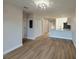 Open floor plan with the kitchen view from the living room at 17099 Carleen Ave, Port Charlotte, FL 33948