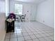 Bright, spacious room with tile floors and a view of the exterior at 1906 E 98Th Ave, Tampa, FL 33612