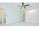 Bright bedroom featuring tiled floors, toilet, and closet at 1931 Jaudon Rd, Dover, FL 33527
