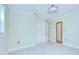 Bright bedroom featuring tiled floors, and closet with paneled doors at 1931 Jaudon Rd, Dover, FL 33527