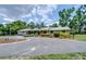 Charming single-story home featuring a well-manicured front yard and a circular driveway at 1931 Jaudon Rd, Dover, FL 33527
