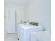 Bright laundry room with modern washer and dryer at 1931 Jaudon Rd, Dover, FL 33527