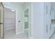 Walk-in pantry with white shelving providing ample storage space at 1931 Jaudon Rd, Dover, FL 33527