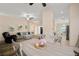 Open floor plan showcases the living room, dining area, and a glimpse of the kitchen at 26501 Whirlaway Ter, Wesley Chapel, FL 33544