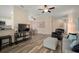 Open floor plan view of the living room, dining area, and kitchen at 26501 Whirlaway Ter, Wesley Chapel, FL 33544
