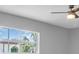 Bright bedroom with fan and a window with natural light at 2711 E 22Nd Ave, Tampa, FL 33605