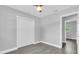 Bright bedroom with ceiling fan, natural light, and closet at 2711 E 22Nd Ave, Tampa, FL 33605