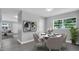 Cozy dining area with a round table, seating for four, and stylish decor at 2711 E 22Nd Ave, Tampa, FL 33605