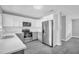 Modern kitchen with stainless steel appliances, quartz countertops and white cabinetry at 2711 E 22Nd Ave, Tampa, FL 33605