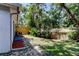 Lawn and yard with a privacy fence offering a peaceful outdoor space at 2721 Baird Ct, Palm Harbor, FL 34684