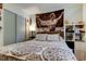 Comfortable bedroom with a bed, a ceiling fan, and a sliding closet door at 2721 Baird Ct, Palm Harbor, FL 34684