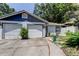 Charming single-Gathering home with a two-car garage and a well-maintained front yard at 2721 Baird Ct, Palm Harbor, FL 34684