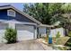 Charming single-Gathering home with a two-car garage and a well-maintained front yard at 2721 Baird Ct, Palm Harbor, FL 34684