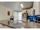 Modern kitchen with stainless steel appliances, a gray countertop, and white cabinets at 2721 Baird Ct, Palm Harbor, FL 34684